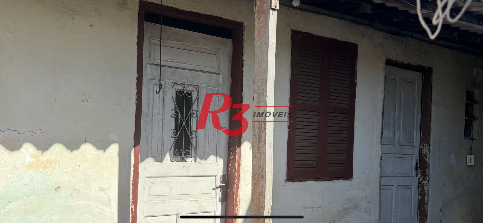 Terreno à venda, 196 m² por R$ 300.000,00 - Areia Branca - Santos/SP