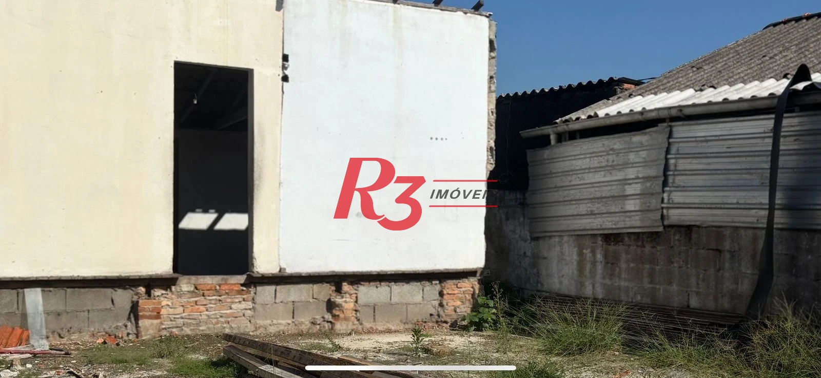 Terreno à venda, 196 m² por R$ 300.000,00 - Areia Branca - Santos/SP