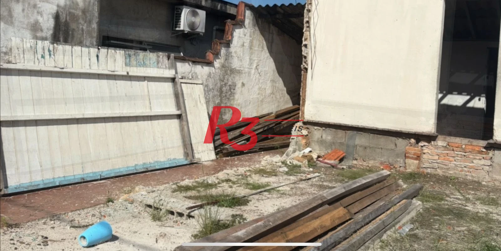 Terreno à venda, 196 m² por R$ 300.000,00 - Areia Branca - Santos/SP