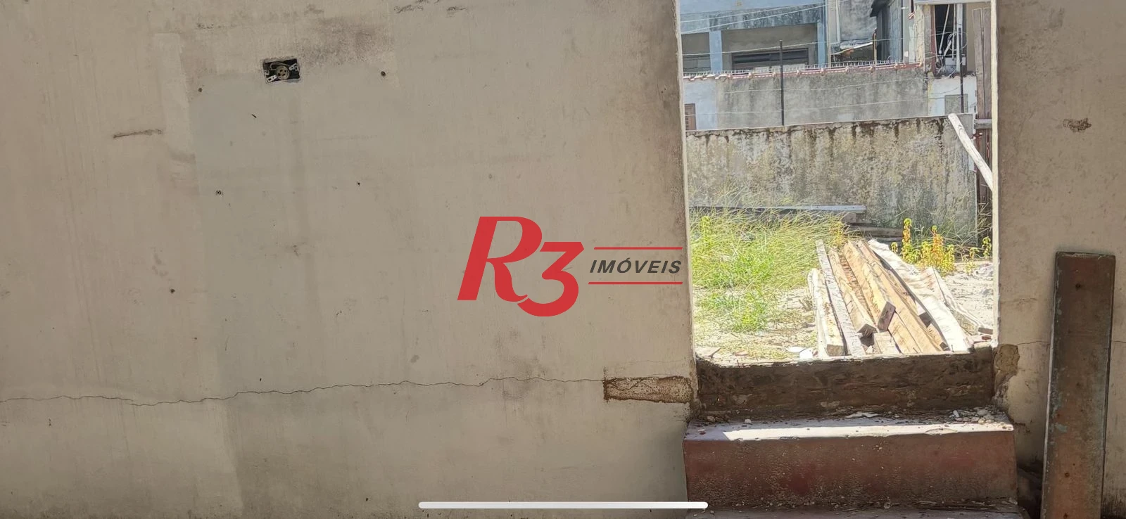 Terreno à venda, 196 m² por R$ 300.000,00 - Areia Branca - Santos/SP