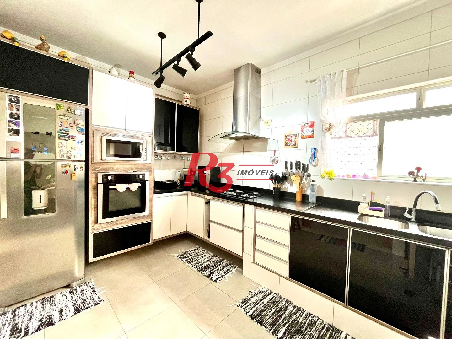 Casa com 4 dormitórios à venda, 225 m² por R$ 1.390.000,00 - Aparecida - Santos/SP