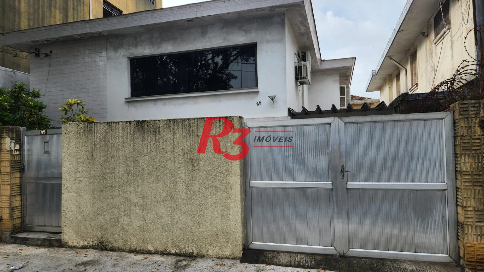 Sobrado com 3 dormitórios à venda, 330 m² por R$ 3.300.000,00 - Aparecida - Santos/SP