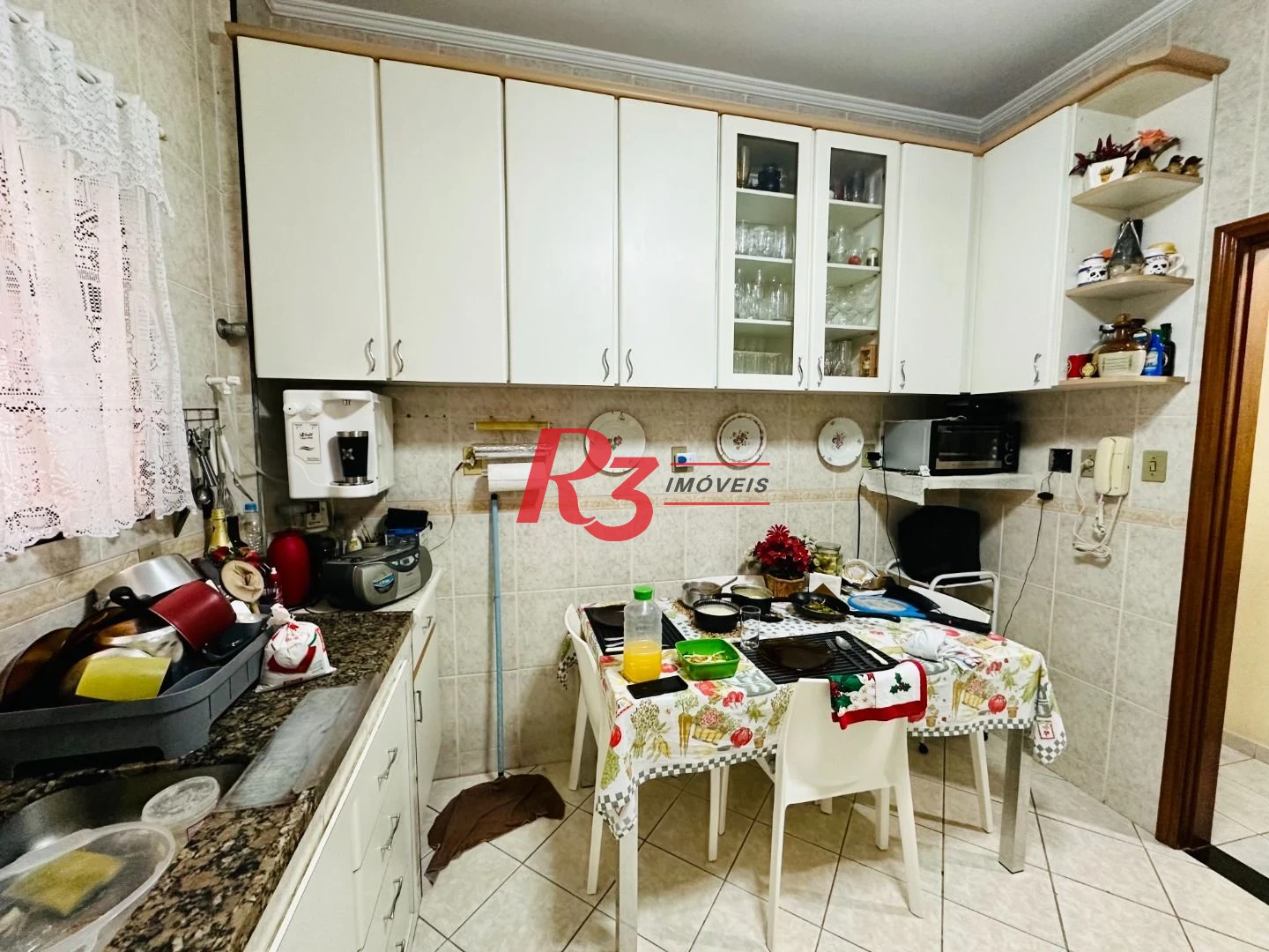 Casa sobreposta à venda 3 quartos suíte 1 vaga Boqueirão Santos