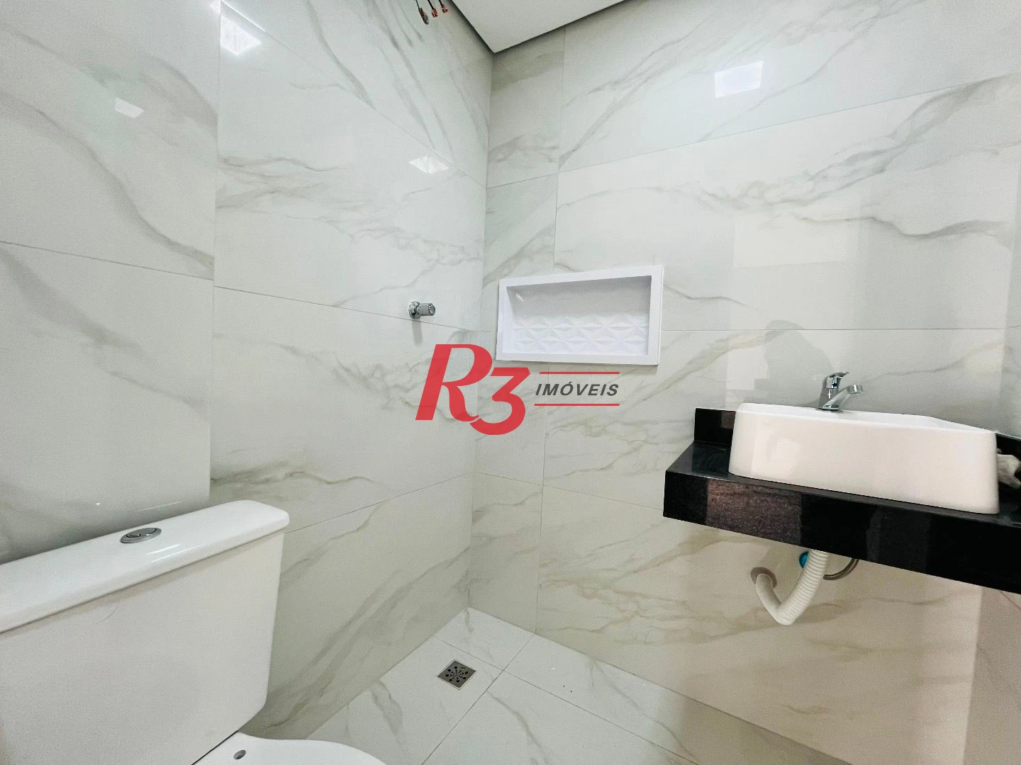 Casa com 3 dormitórios à venda, 176 m² por R$ 1.600.000,00 - Boqueirão - Santos/SP