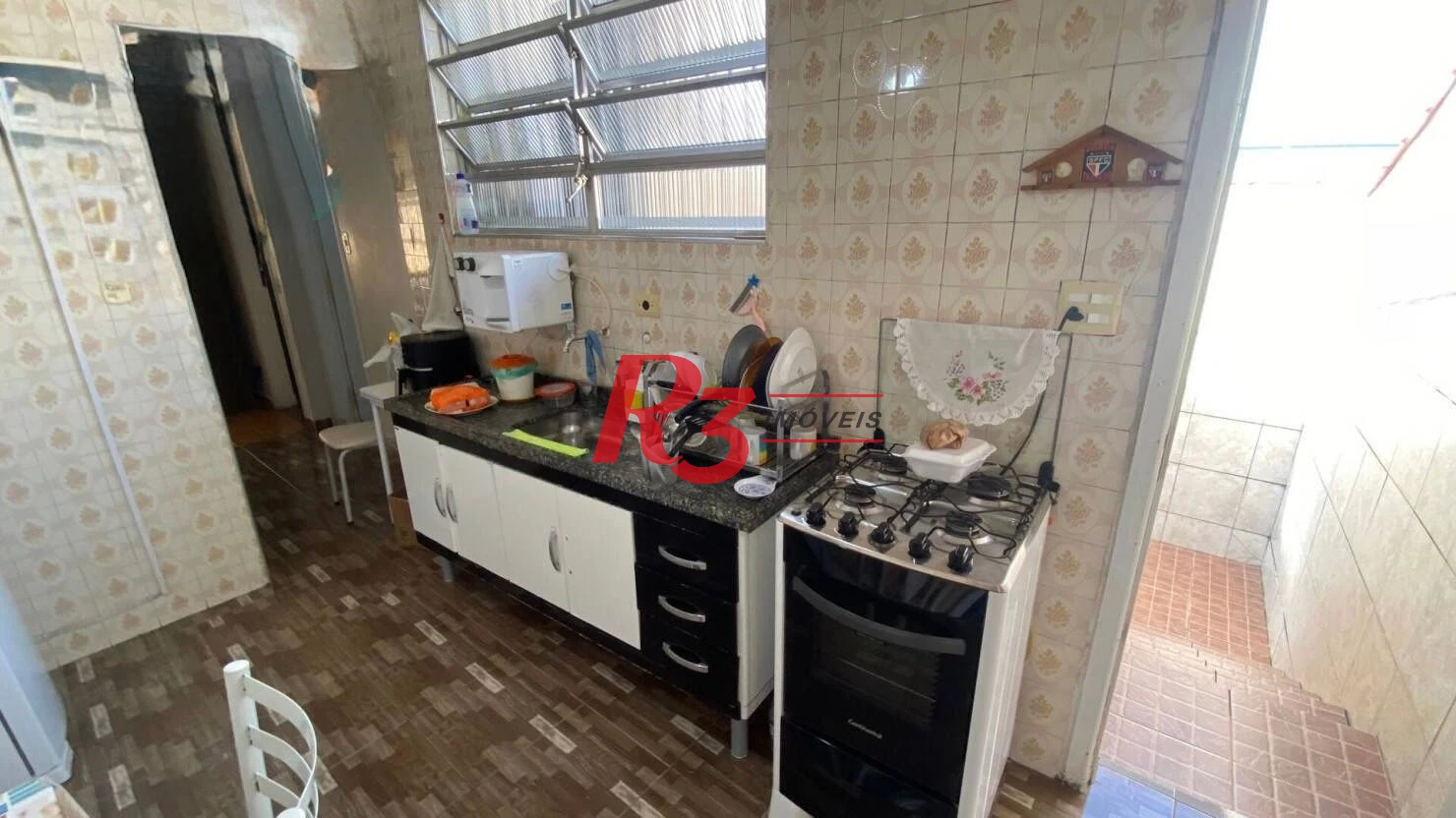 Casa com 3 dormitórios à venda, 103 m² por R$ 680.000,00 - Vila Belmiro - Santos/SP